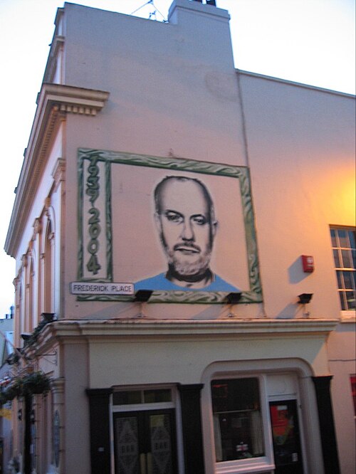 Een muurschildering van John Peel in Belfast.
